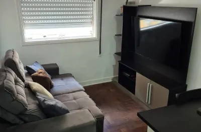 Locação 1 quarto mobiliado com elevador, na praia da embaré em santos