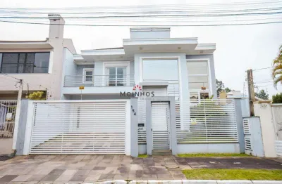 Casa com 3 quartos à venda na Rua Dinamarca, 154, Moinhos De Vento, Canoas