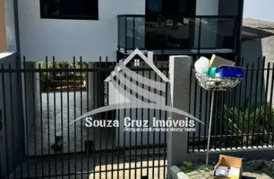 Sobrado de frente para rua com 03 quartos - terreno nos fundos.