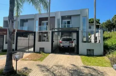 Casa em condomínio fechado com 2 quartos à venda na rua arthur haas, 24, rondônia, novo hamburgo por r$ 405.000