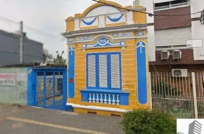 Compre propriedade para fins residenciais e comerciais localizada na rua Joaquim