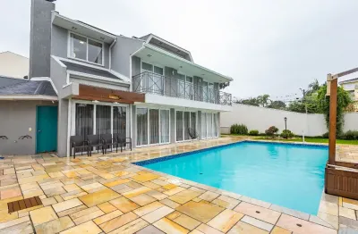 Casa  com 4 suítes no ahú,aquecimento solar- curitiba/pr