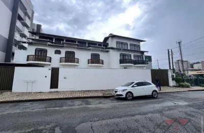 Saguaçu - predio residencial e comercial com 3 pavimentos, sendo 4 unidades