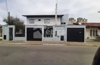 A venda em itajaí casa térrea e apartamento no piso superior, bairro são joão