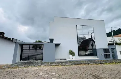 Casa geminada com 3 suítes no bairro ilha da figueira
