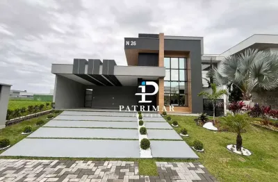 Casa nova de alto padrão no condomínio alphaville maricá i. 3 quartos, suíte com closet, sala com pé direito alto, piscina com led e cascata, área gou