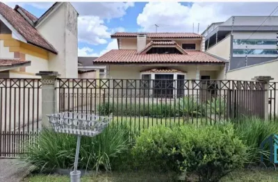(permuta ou financiamento) casa a venda com amplo terreno, 04 quartos c/suíte, 05 vagas, salão de festas, no tarumã em curitiba pr