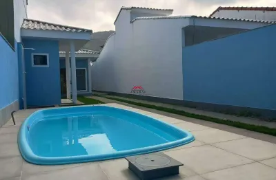 Casa residencial de 3 suítes em maricá (jardim atlântico central) — frente, 100 m²