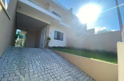 Sobrado geminado no iririú com 3 quartos para venda, 121 m²