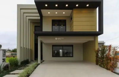 Casa em condomínio fechado com 3 quartos à venda na rua cairu, 440, rio branco, canoas, 177 m2 por r$ 1.390.000