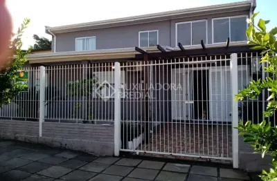 Casa em condomínio fechado com 3 quartos à venda na rua tupi, 408, igara, canoas, 108 m2 por r$ 499.000