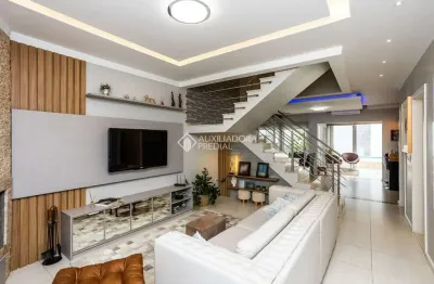 Casa em condomínio fechado com 4 quartos à venda na rua bélgica, 76, marechal rondon, canoas, 221 m2 por r$ 1.999.000