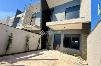 Casa com 3 quartos à venda na rua luis alberto ribeiro de castro, 141, estância velha, canoas, 128 m2 por r$ 850.000