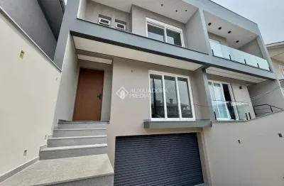 Casa com 3 quartos à venda na rua dinamarca, 223, estância velha, canoas, 200 m2 por r$ 1.450.000