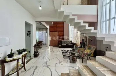 Casa com 3 quartos à venda na rua doutor joão césar, 369, estância velha, canoas, 238 m2 por r$ 850.000