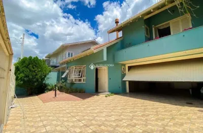 Casa com 3 quartos à venda na rua irmão adão rui, 398, marechal rondon, canoas, 241 m2 por r$ 1.690.000