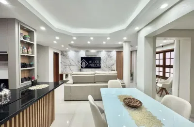 Casa com 4 quartos à venda na rua joão paulo ii, 73, harmonia, canoas, 196 m2 por r$ 999.000