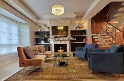 Casa com 4 quartos à venda na rua resedá, 124, estância velha, canoas, 239 m2 por r$ 1.720.000