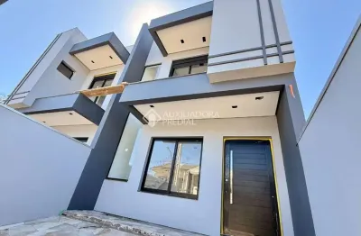 Casa com 3 quartos à venda na rua doutor iran maciel, 310, estância velha, canoas, 104 m2 por r$ 790.000