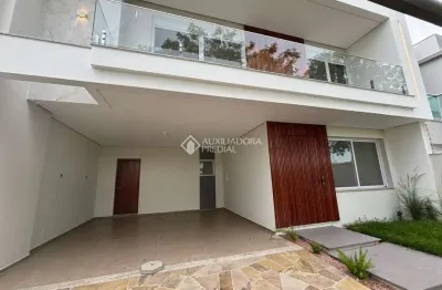 Casa com 3 quartos à venda na Rua Luis Alberto Ribeiro de Castro, 101, Estância Velha, Canoas, 231 m2 por R$ 1.696.000