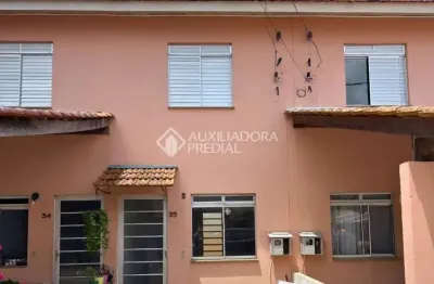 Casa em condomínio fechado com 2 quartos à venda na Rua Boa Esperança, 2095, Rio Branco, Canoas, 55 m2 por R$ 199.900