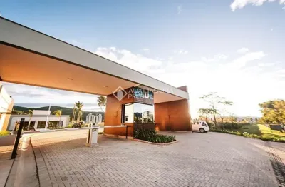 Terreno em condomínio fechado à venda na avenida deltaville, 301, beira rio, biguaçu, 150 m2 por r$ 285.000