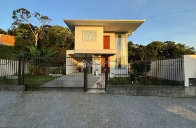 Casa com 3 quartos à venda na rodovia sc-407, 148, beira rio, biguaçu, 150 m2 por r$ 785.000