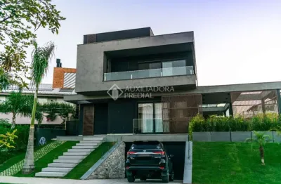 Casa em condomínio fechado com 5 quartos à venda na rodovia doutor antônio luiz moura gonzaga, 3801, rio tavares, florianópolis, 448 m2 por r$ 11.000.000