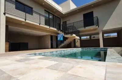 Linda casa térra em condomínio terras de siena - 3 suítes, escritório, piscina