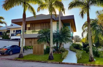Casa tríplex de 550m² com 5 suítes e 4 vagas à venda no del lago barra da tijuca