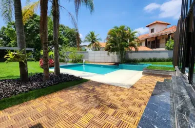 Casa duplex de1250m² com 5 suítes e 4 vagas à venda no condomínio mansões.