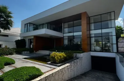 Casa contemporânea mobiliada com 5 suítes no condomínio mansões