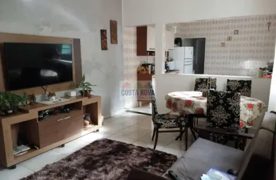 Casa a venda com 3 quartos, 3 banheirso e 2 vagas de garagem na mirim em praia grande- sp