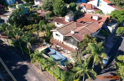 Casa com 3 dormitórios para alugar, 667 m² por r$ 11.690,00/mês - guarujá - porto alegre/rs