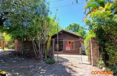 Casa com 4 dormitórios para alugar, 220 m² por R$ 2.055,00/mês - Guarujá - Porto Alegre/RS