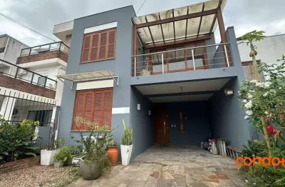 Casa com 4 dormitórios para alugar, 169 m² por r$ 5.500,00/mês - hípica - porto alegre/rs