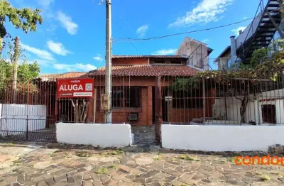 Casa com 4 dormitórios para alugar, 117 m² por R$ 2.500,00/mês - Vila Nova - Porto Alegre/RS