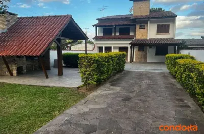 Sobrado com 3 dormitórios para alugar por R$ 4.900,00/mês - Hípica - Porto Alegre/RS