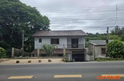 Casa com 2 dormitórios para alugar, 150 m² por R$ 3.385,00/mês - Vila Nova - Porto Alegre/RS