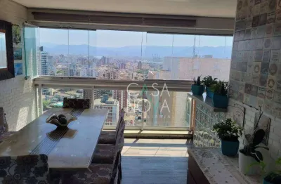 Ap. 2 dorms. suíte, ponta da praia 2 vagas de garagem