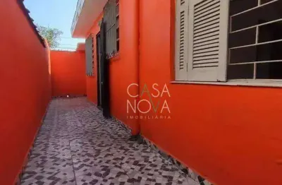 Casa com 2 dormitórios à venda, 119 m² por R$ 315.000 - Parque Bitaru - São Vicente/SP