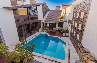 Casa com 4 quartos à venda na rua arnaldo moreira douat, 55, floresta, joinville por r$ 2.200.000