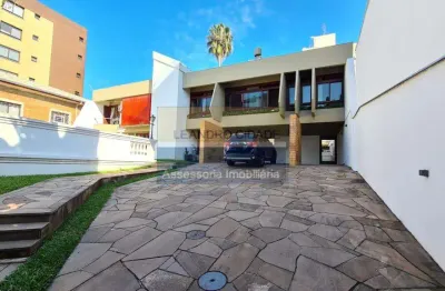 Casa 5 dormitórios à venda no bairro menino deus com 455 m² de área privativa - 6 vagas de garagem