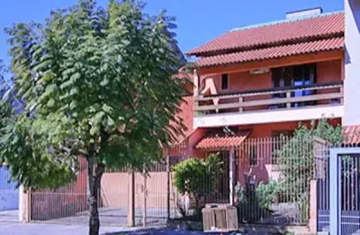 Casa com 3 quartos à venda no Jardim Planalto, Porto Alegre 