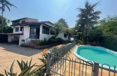 Casa em condomínio fechado com 4 quartos à venda na rua pedro a. a. de freitas filho, 186, jardim itu sabará, porto alegre, 525 m2 por r$ 1.500.000