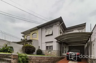 Casa com 3 quartos à venda na rua veador porto, 251, santana, porto alegre, 200 m2 por r$ 849.900