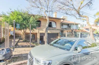 Casa com 4 quartos à venda na rua dona mimi moro, 60, boa vista, porto alegre, 300 m2 por r$ 1.200.000