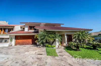 Casa em condomínio fechado com 3 quartos à venda na rua alcebíades antônio dos santos, 356, nonoai, porto alegre, 451 m2 por r$ 2.400.000