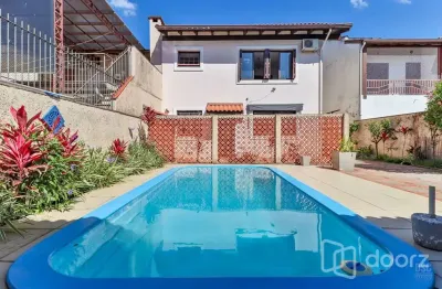 Casa com 3 quartos à venda na rua doutor joão palombini, 55, ipanema, porto alegre, 248 m2 por r$ 770.000