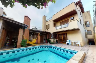 Casa com 4 quartos à venda na rua pinto da rocha, 383, partenon, porto alegre, 420 m2 por r$ 890.000